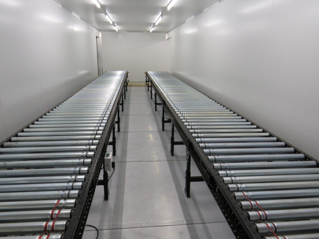 Powered roller conveyors